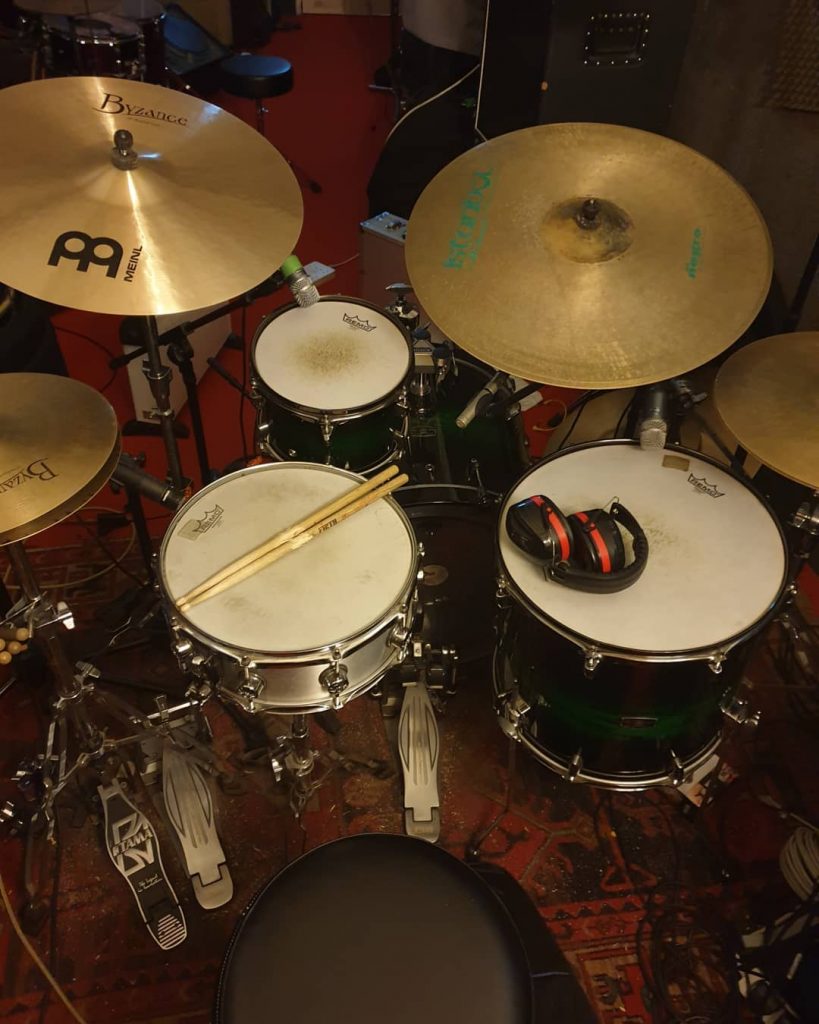 Picture of the my drum kit including the new mic setup for Skype teaching